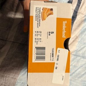 Brand new. Never worn. Toddler timbs size 5